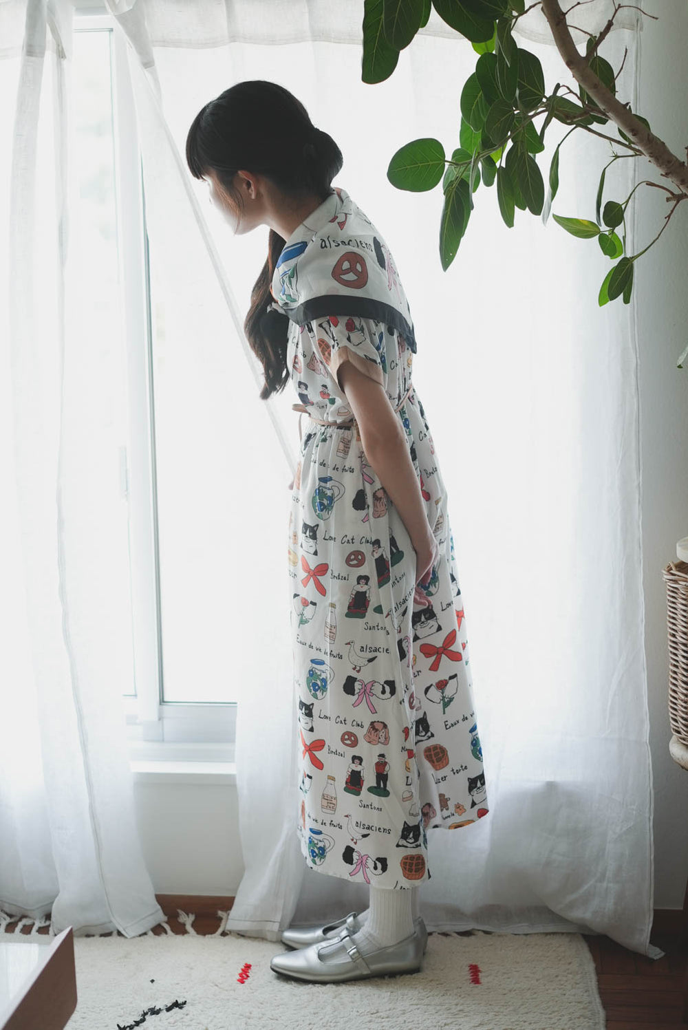 Cat Nordic Travel Guide and Colored Trim Vest Dress