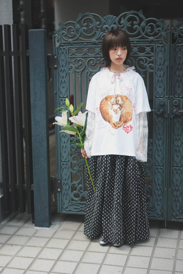 Three-dimensional polka dot fabric skirt with bows on both sides