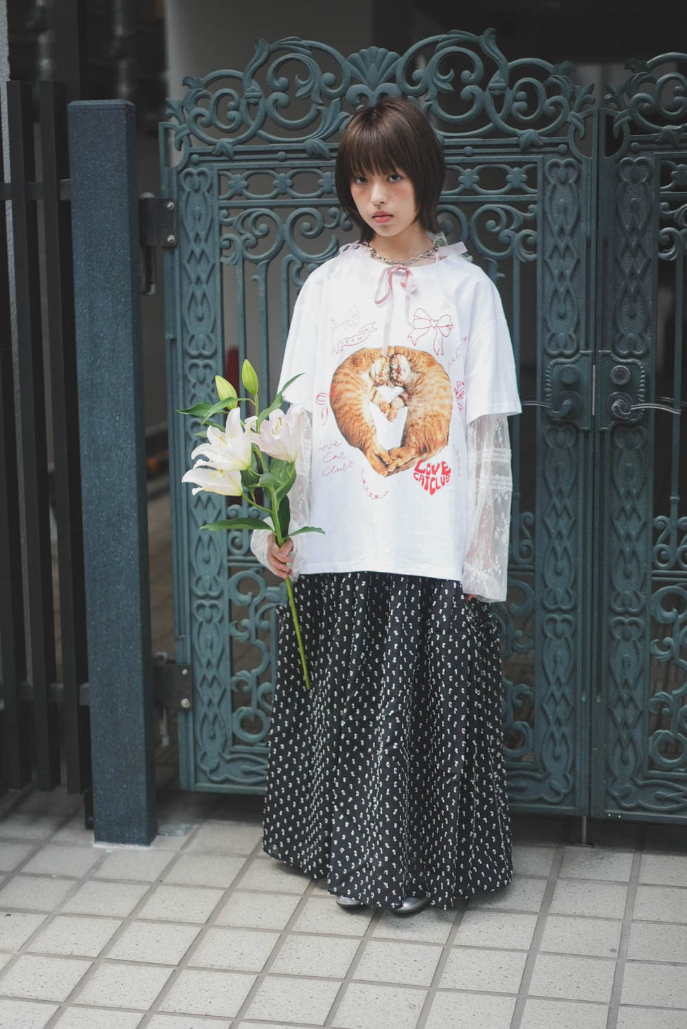 Three-dimensional polka dot fabric skirt with bows on both sides