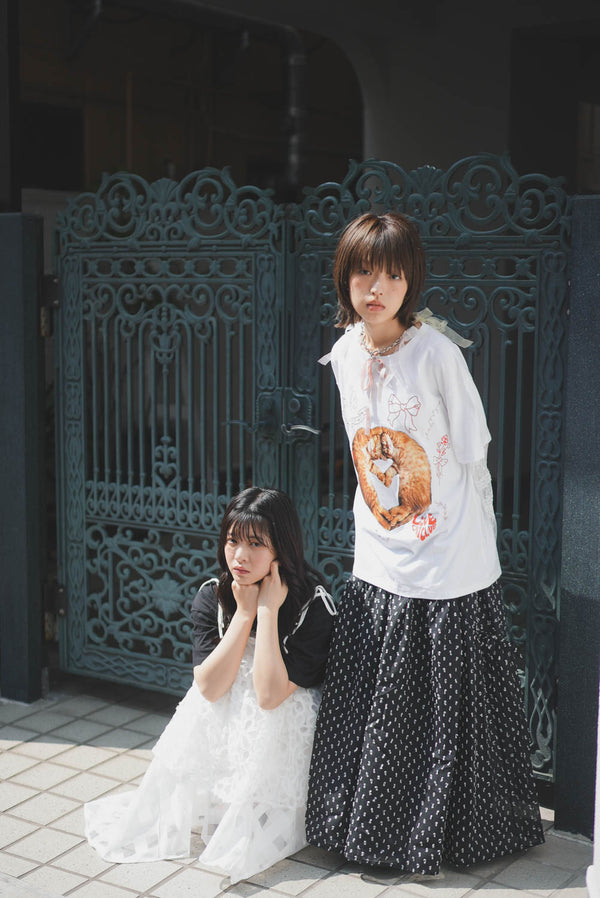 Three-dimensional polka dot fabric skirt with bows on both sides