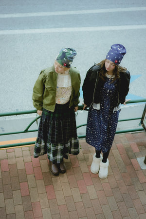 And a three-layer plaid skirt