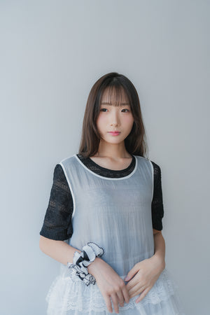 Sheer and lace layered vest