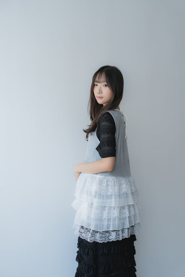 Sheer and lace layered vest