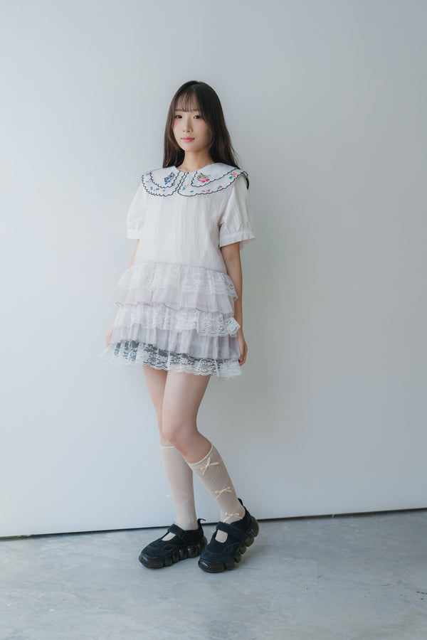 Sheer and lace layered vest