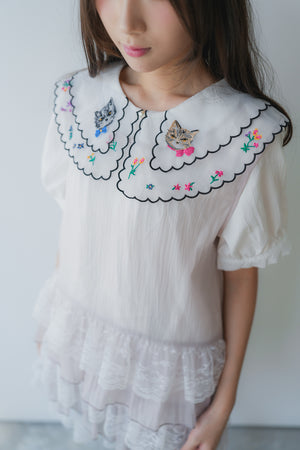 Sheer and lace layered vest