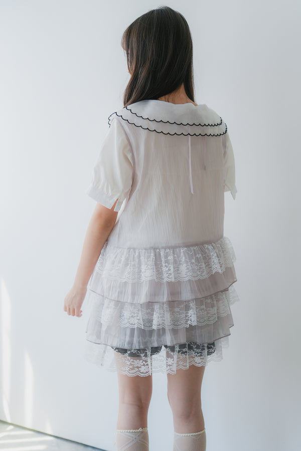 Sheer and lace layered vest