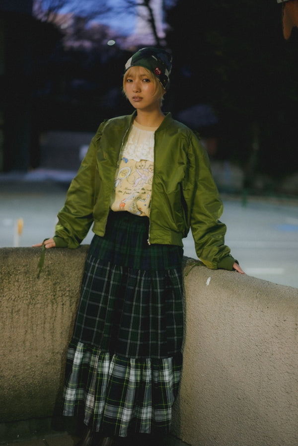 And a three-layer plaid skirt