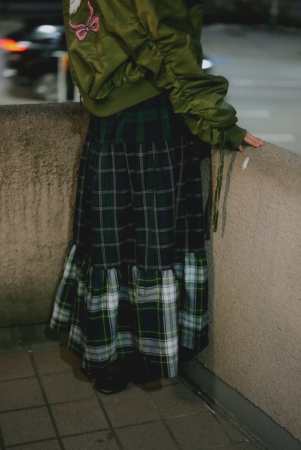 And a three-layer plaid skirt