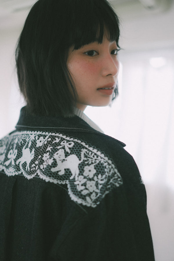 Denim jacket with lace cat print lining