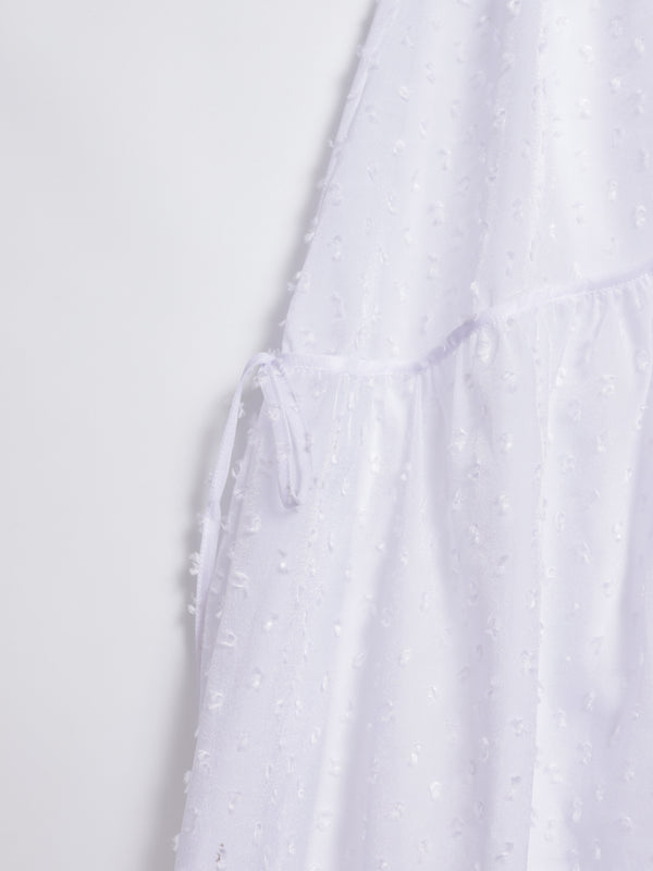 Three-dimensional polka dot fabric skirt with bows on both sides