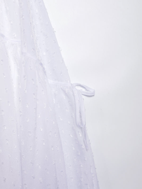 Three-dimensional polka dot fabric skirt with bows on both sides