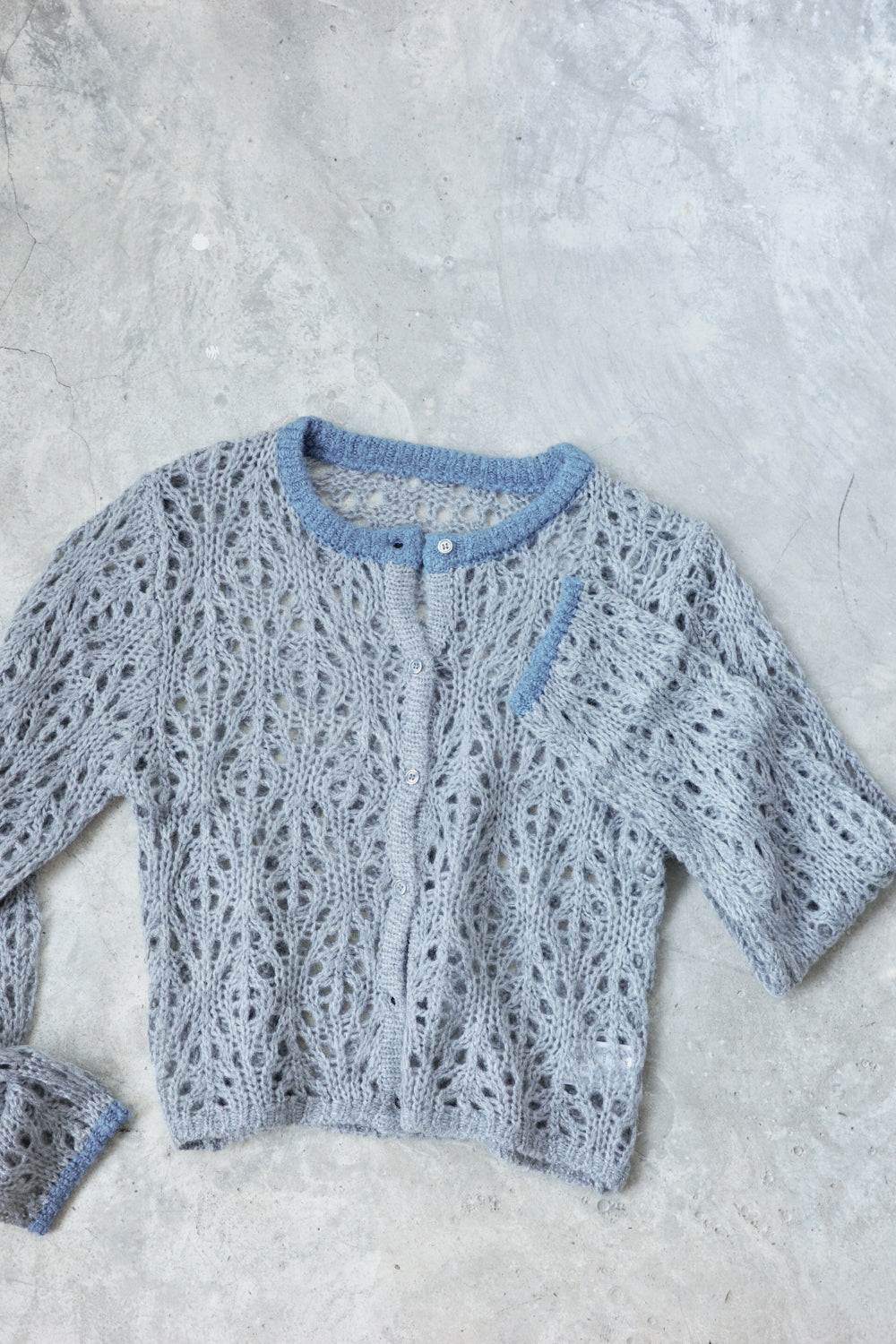 Hollow color crew neck cardigan