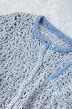 Hollow color crew neck cardigan