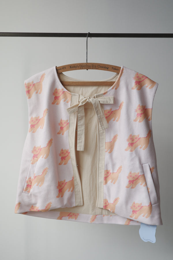 Nordic orange cat knotted plush vest